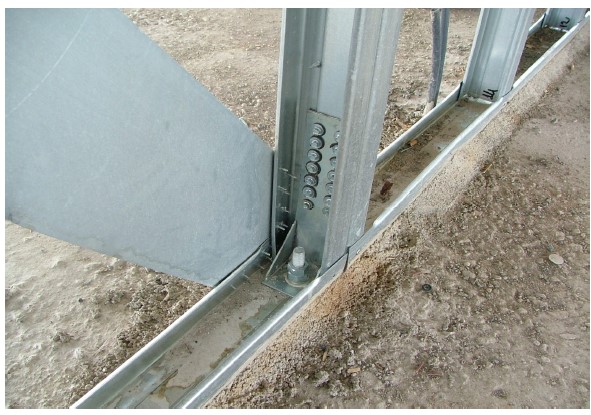 Wall panel to foundation connection